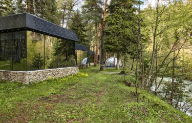Mirror house with panoramic windows and river view