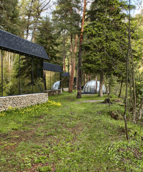 Mirrored house with panoramic windows and river view